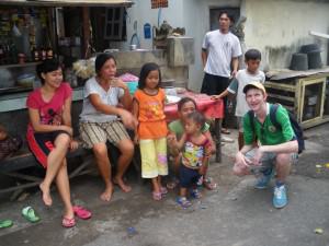 Jonny Blair with the locals in Singaraja in Bali, Indonesia - a lifestyle of travel