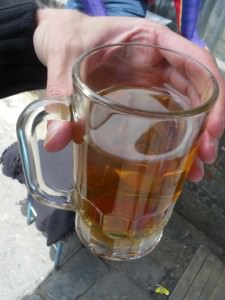 Bolivian drinks Mocochinchi in La Paz
