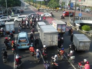 crossing the road in jakarta can be crazy traffic