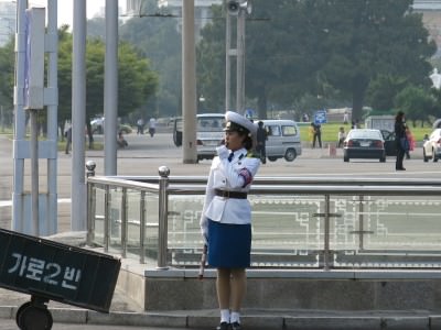 Eye candy with the Pyongyang traffic ladies. Don't get your Yang out or you'll get Pyonged!