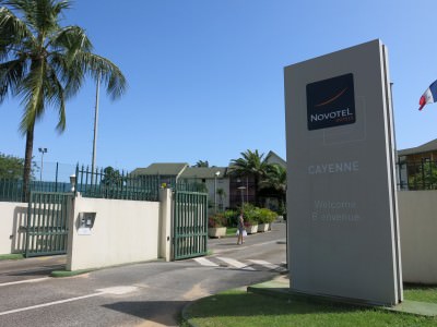 The entrance to the Novotel Hotel in Cayenne, on down the road to the right of this photo is the beach for turtle viewing.