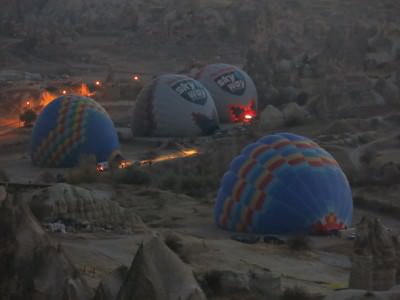 Hot air balloons blowing up in Goreme.