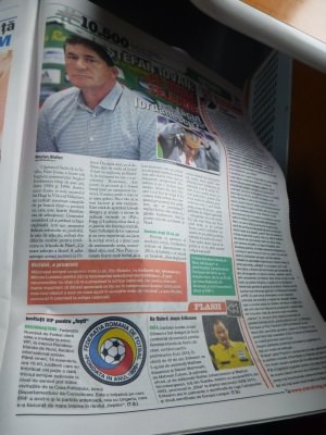 Newspaper with Romania v. Northern Ireland match preview.