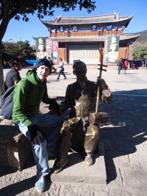 Jonny Blair at music square in Shuhe Old Town in China a lifestyle of travel