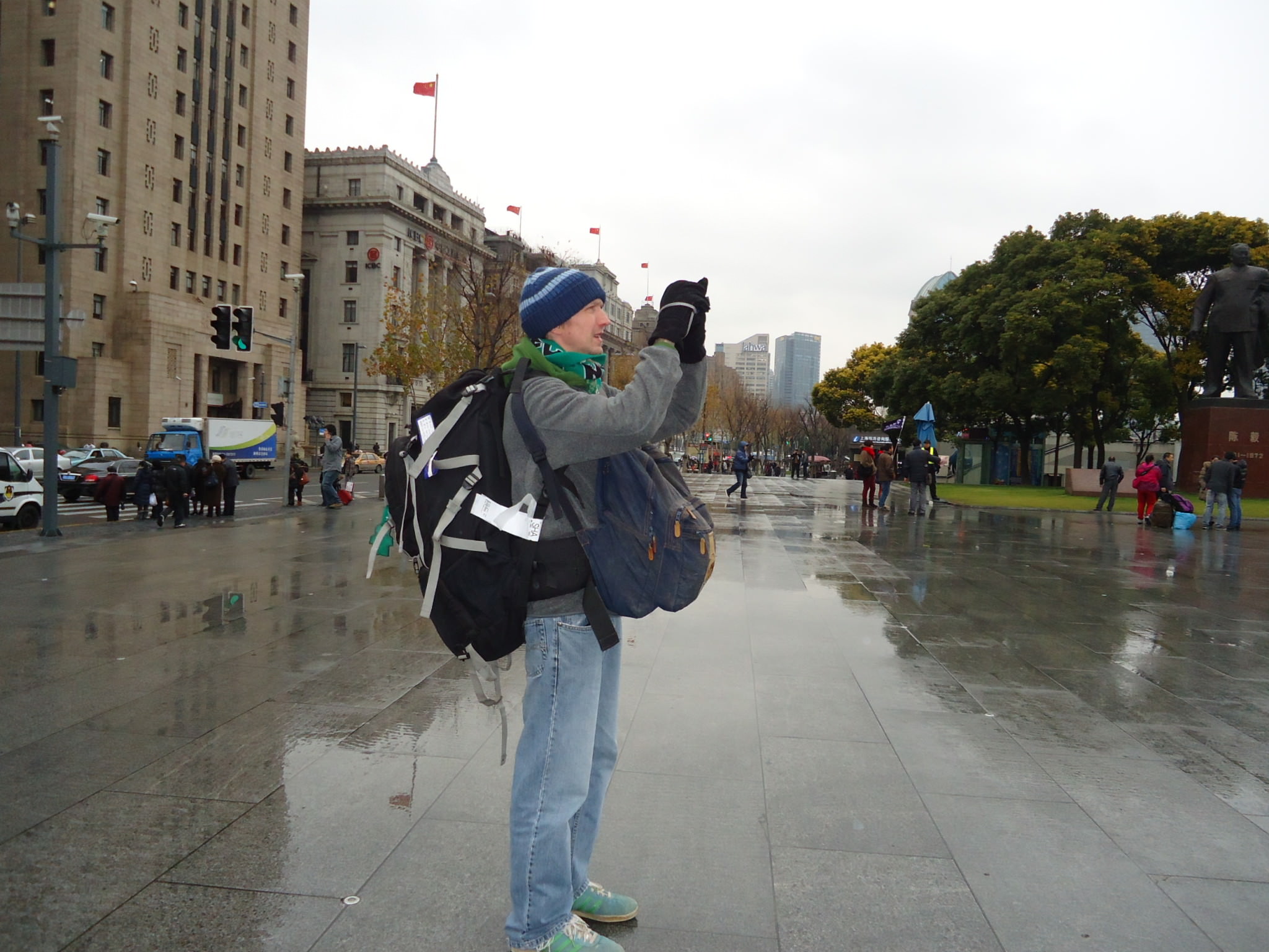 Jonny Blair taking a photo in Shanghai, CHINA. He lives a lifestyle of travel.