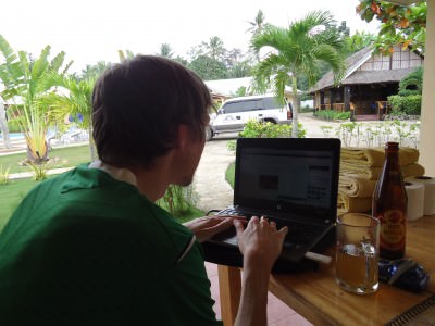 Jonny Blair lives a lifestyle of travel - having a beer in the Philippines