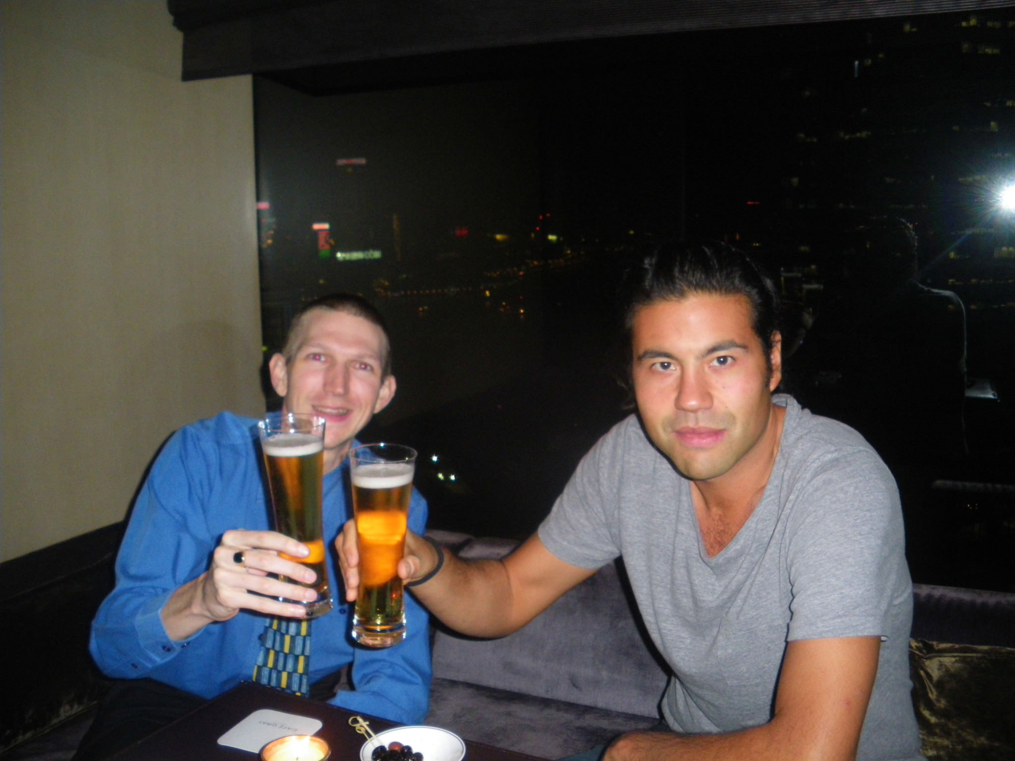 Jonny Blair lives a lifestyle of travel and enjoys a posh beer in the Upper House Hotel in Hong Kong