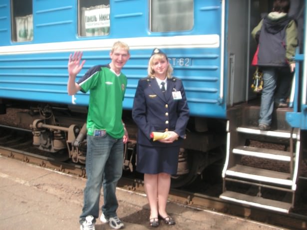 Jonny Blair boarding a train from Minsk to Bobruisk in 2007 living a lifestyle of travel