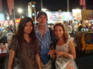 Jonny Blair Eva Jun and Natalja Tsumakova at a night market in Tainan, Taiwan