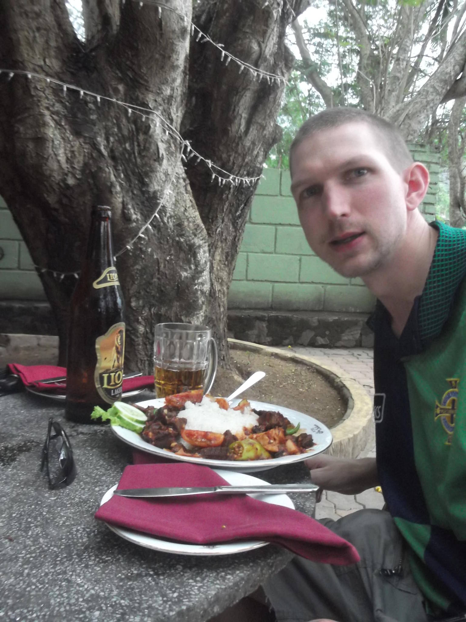 Jonny Blair trying devilled beef in Kurunegala