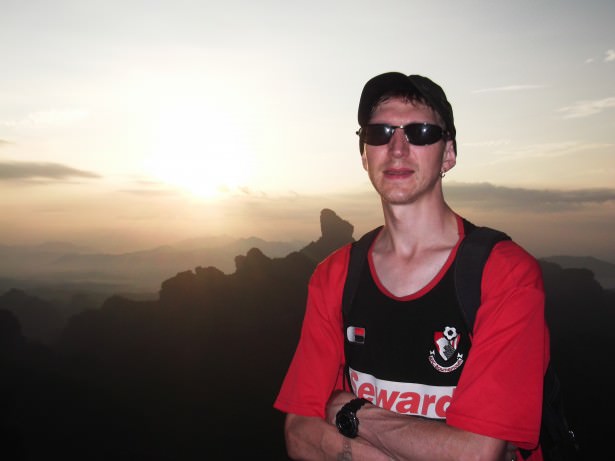 Jonny Blair enjoying sunrise at Elder Peak in China