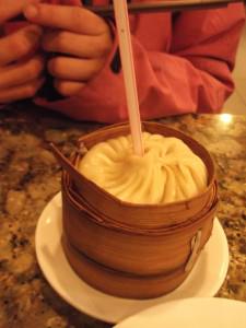 Larger shanghai dumpling with soup in it