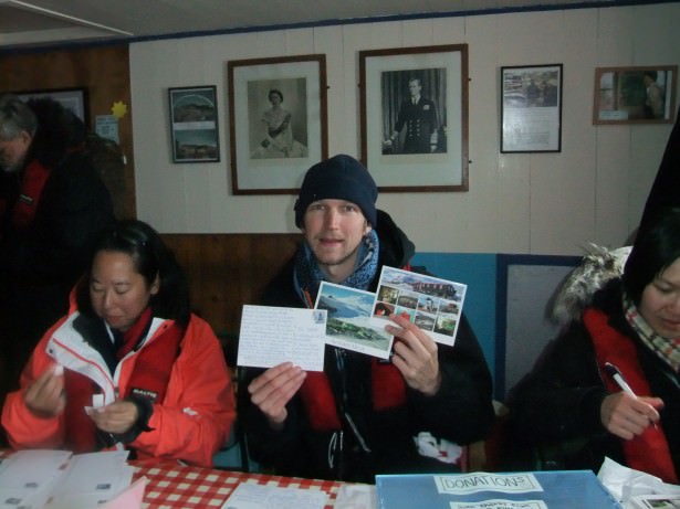 posting postcards in Antarctica