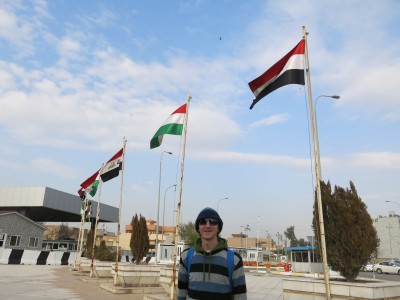 At the parliament in Erbil, Kurdistan and Iraq flags fly side by side.