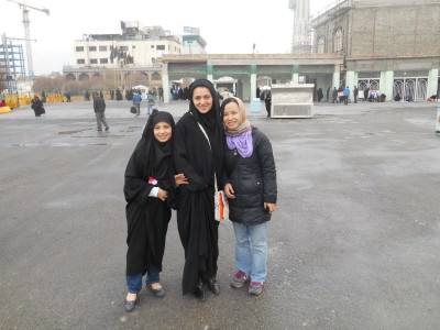 My girlfriend and two local Muslims at the Imam Reza Shrine in Mashhad.