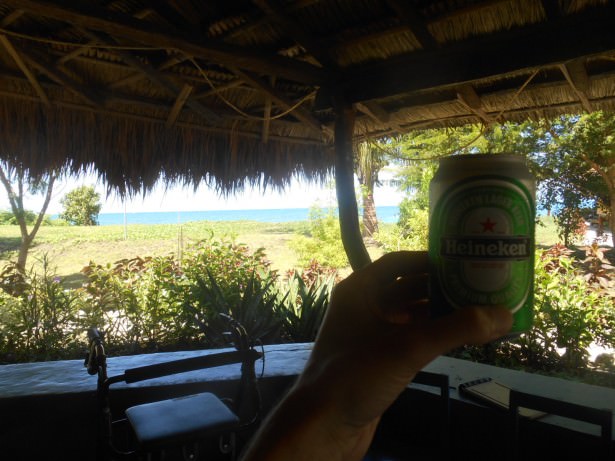 Relaxing with a beer in the shade.