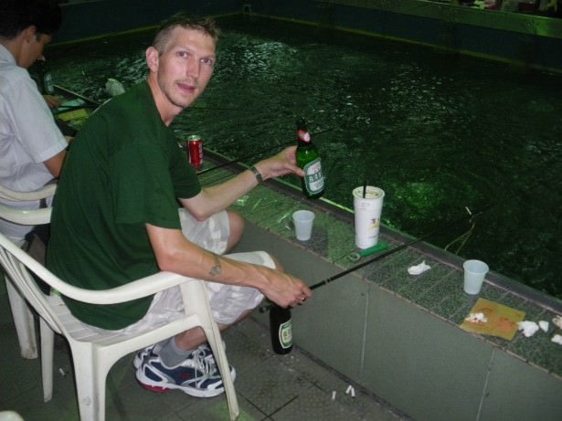 Having a beer catching shrimps in Xinying, Taiwan