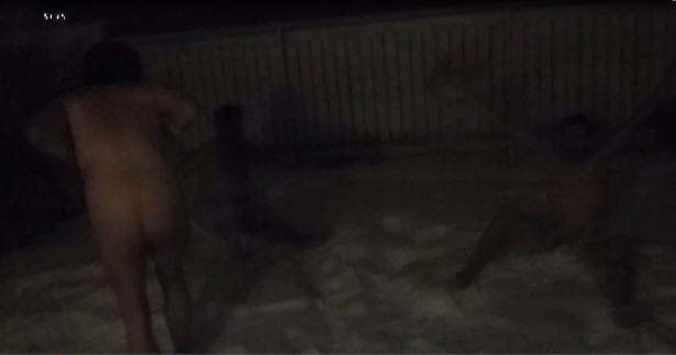 3 of us naked diving in the snow.