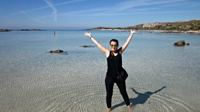 World Traveller Sofie at Elafonissi Pink Beach in Greece.