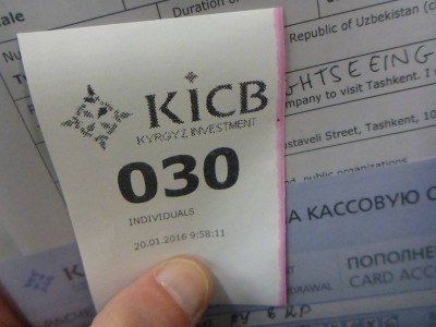 With my ticket waiting to pay inside the KICB