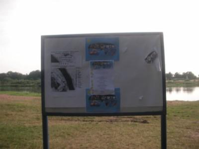 An information board by the Belshina River