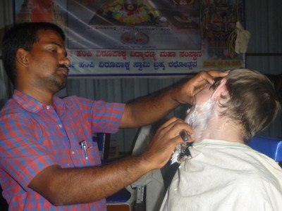 Getting my beard chopped off in Hampi, India