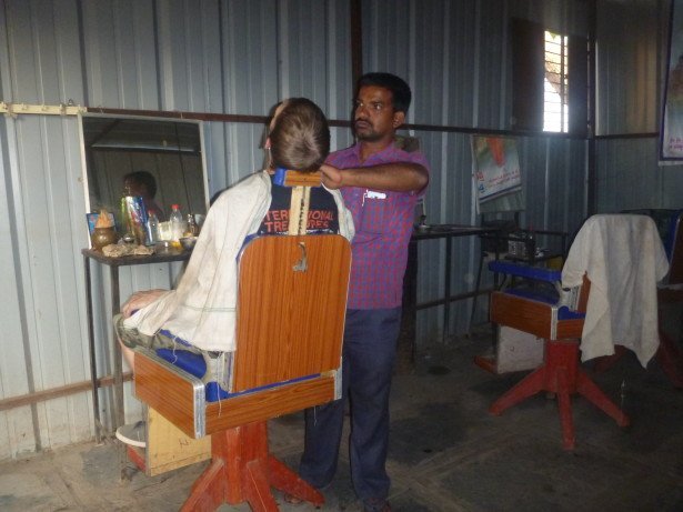 Getting my beard chopped off in Hampi, India