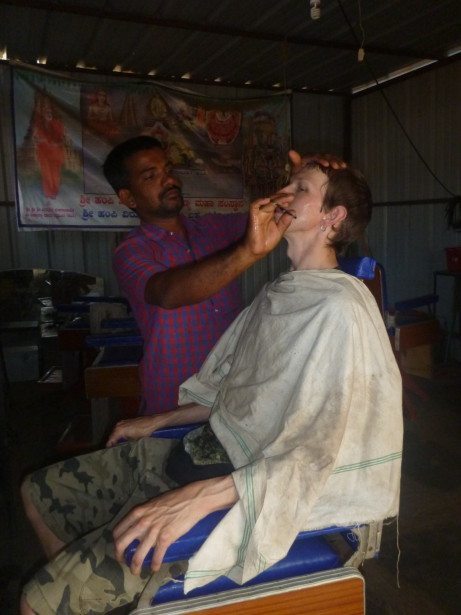 Getting my beard chopped off in Hampi, India