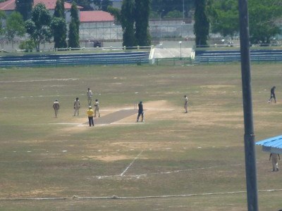 Watching cricket at Netaji Cricket Stadium