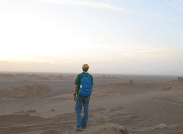 Jonny Blair backpacking in Kaluts desert Iran