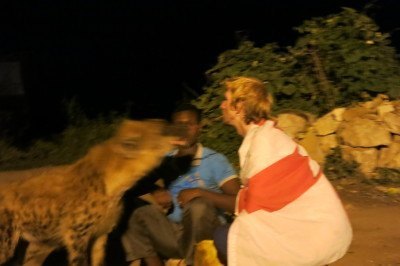 One of my crazy moments in Africa - feeding hyenas hand to mouth and mouth to mouth