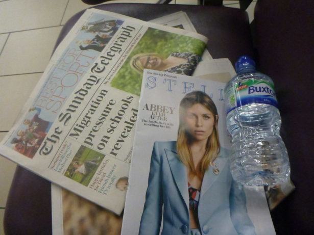 Newspaper and water