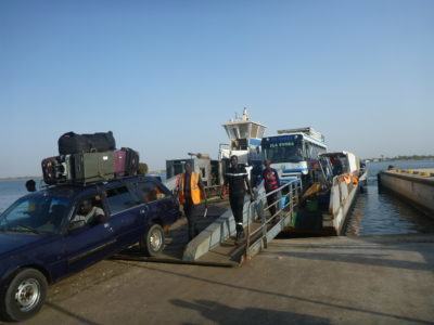 Boarding the ferry at Foundiougne, Senegal
