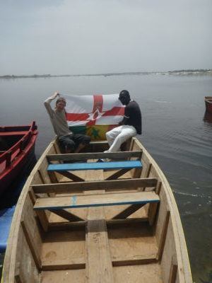 Northern Ireland and Senegal flags on Lac Rose