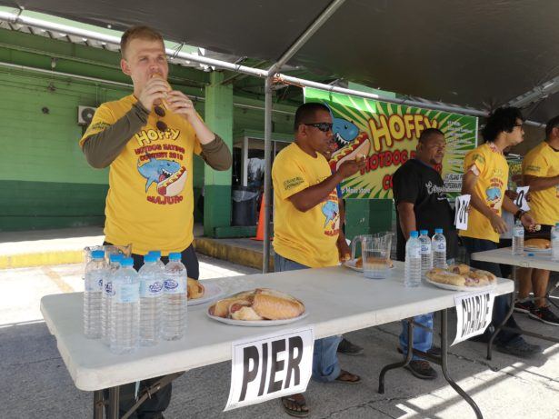 Pier representing Young Pioneer Tours at the Annual Hoffy Hot Dog Eating Contest in Majuro, Marshall Islands