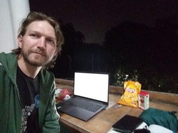 Travel Blogging in Haiti - working on the balcony at The Park Hostel on Free Wi-Fi