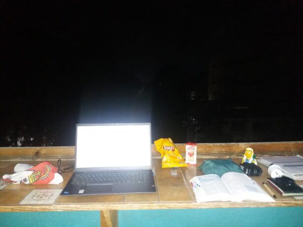 Travel Blogging in Haiti - working on the balcony at The Park Hostel on Free Wi-Fi