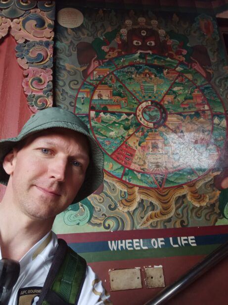 Spinning The Wheel At The Boudhanath Stupa And Buddhist Shrine, Kathmandu