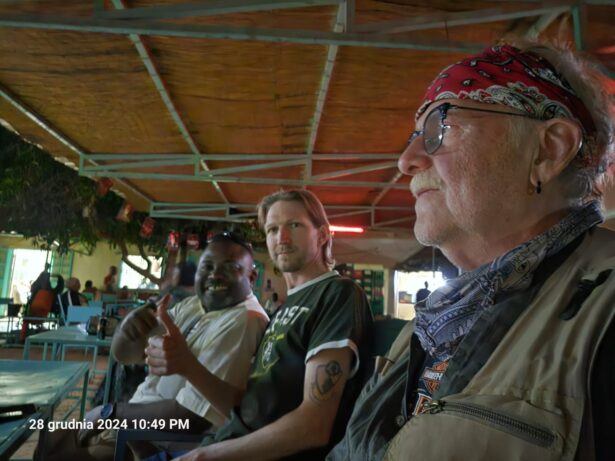 Augustine, Marek and I getting ready for Kennedy Star to start At Bar Caupa Bangou, Niamey, Niger